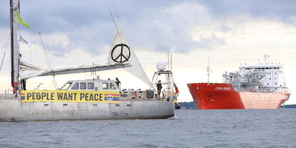 В шведском порту активисты Greenpeace заблокировали судно с российским СПГ 